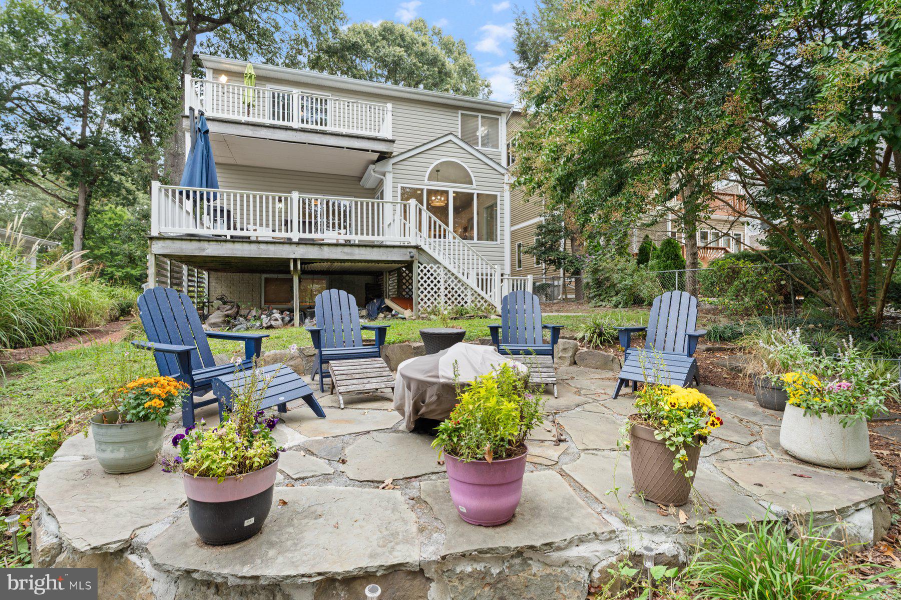 359 Valley Stream Road Severna Park, MD 21146 - Photo 39 of 55 a front view of a house with a chairs and a potted plant
