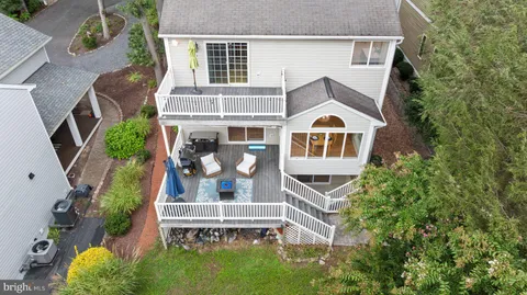 a view of balcony with wooden floor