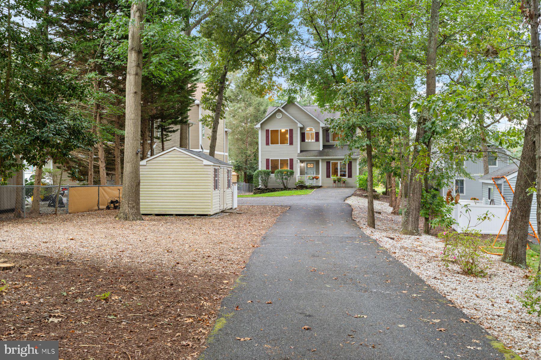 359 Valley Stream Road Severna Park, MD 21146 - Photo 5 of 55 a view of a large house with a street
