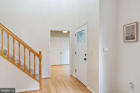 a work room with furniture and wooden floor