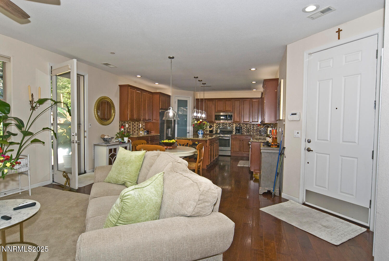 4823 Tree Swallow Lane Sparks, NV 89436 - Photo 6 of 12 a living room with furniture and kitchen view