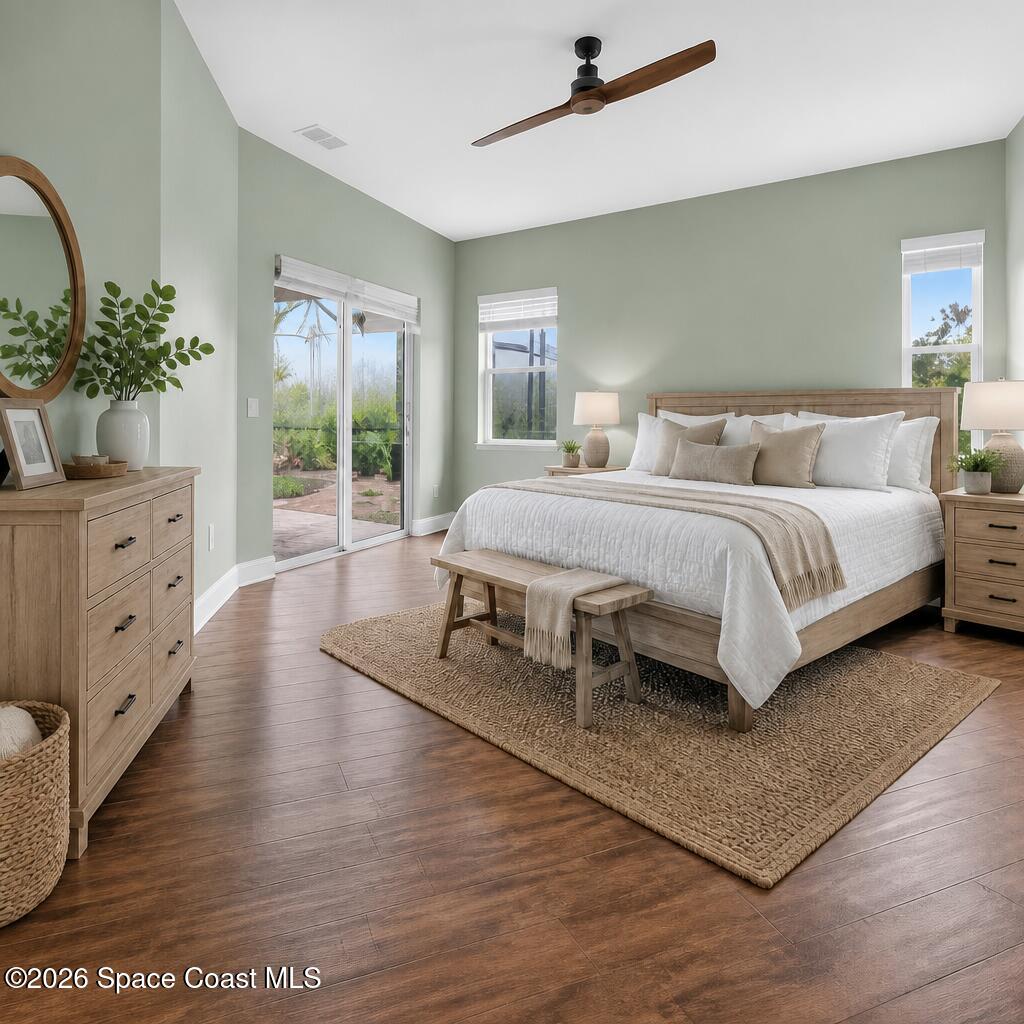 1475 Dalbora Road Merritt Island, FL 32953 - Photo 34 of 57 a spacious bedroom with a bed and window