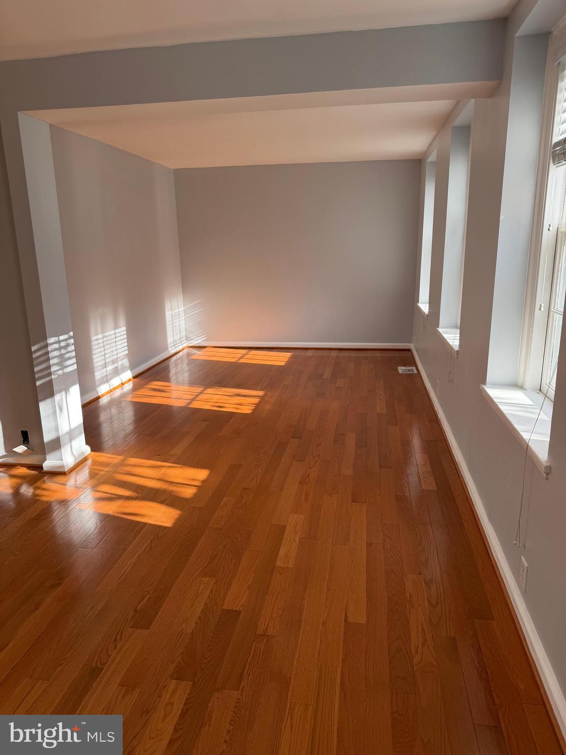 3881 Porter Street Northwest, Unit A295 Washington, DC 20016 - Photo 13 of 15 a view of a room with wooden floor