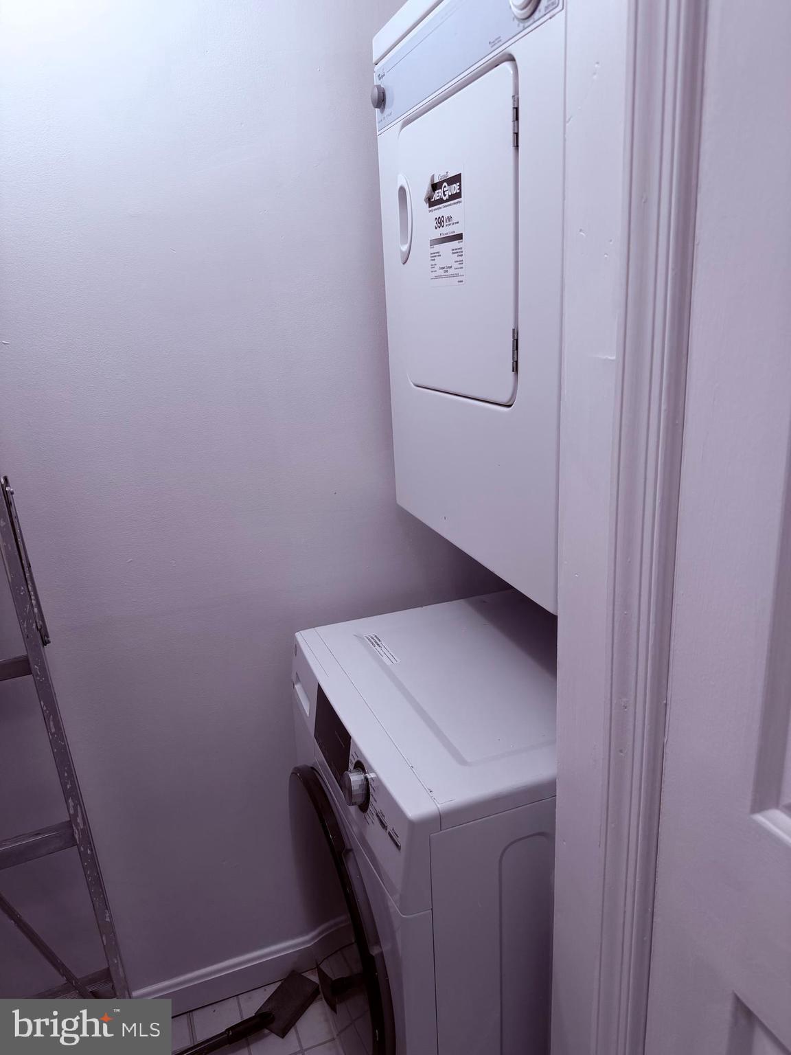 3881 Porter Street Northwest, Unit A295 Washington, DC 20016 - Photo 15 of 15 a utility room with dryer and washer