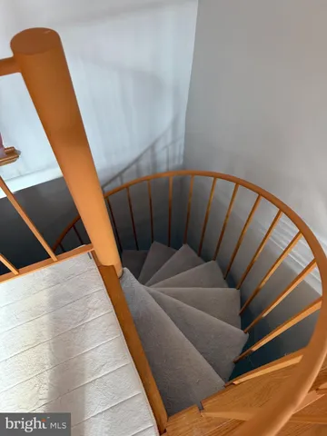 a kitchen with a refrigerator and a stove
