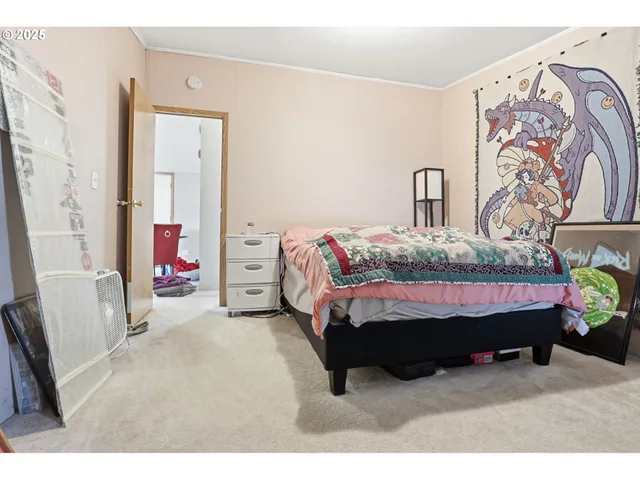 a bed room with a bed and a couch