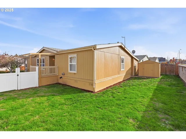 a view of a backyard with a garden