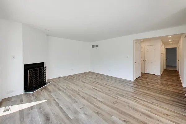 a view of a livingroom with wooden floor