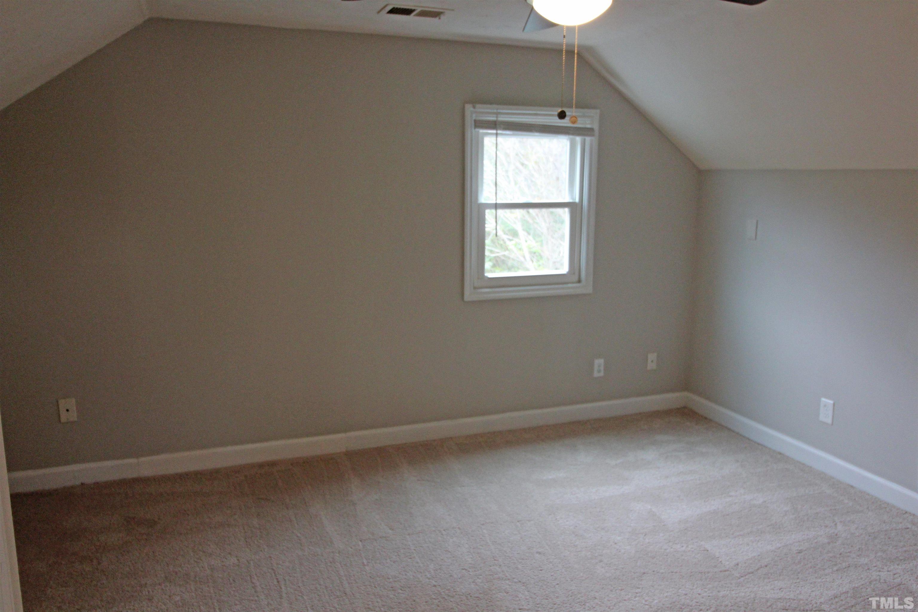 3202 Old Stage Road North Coats, NC 27521 - Photo 13 of 20 an empty room with a window