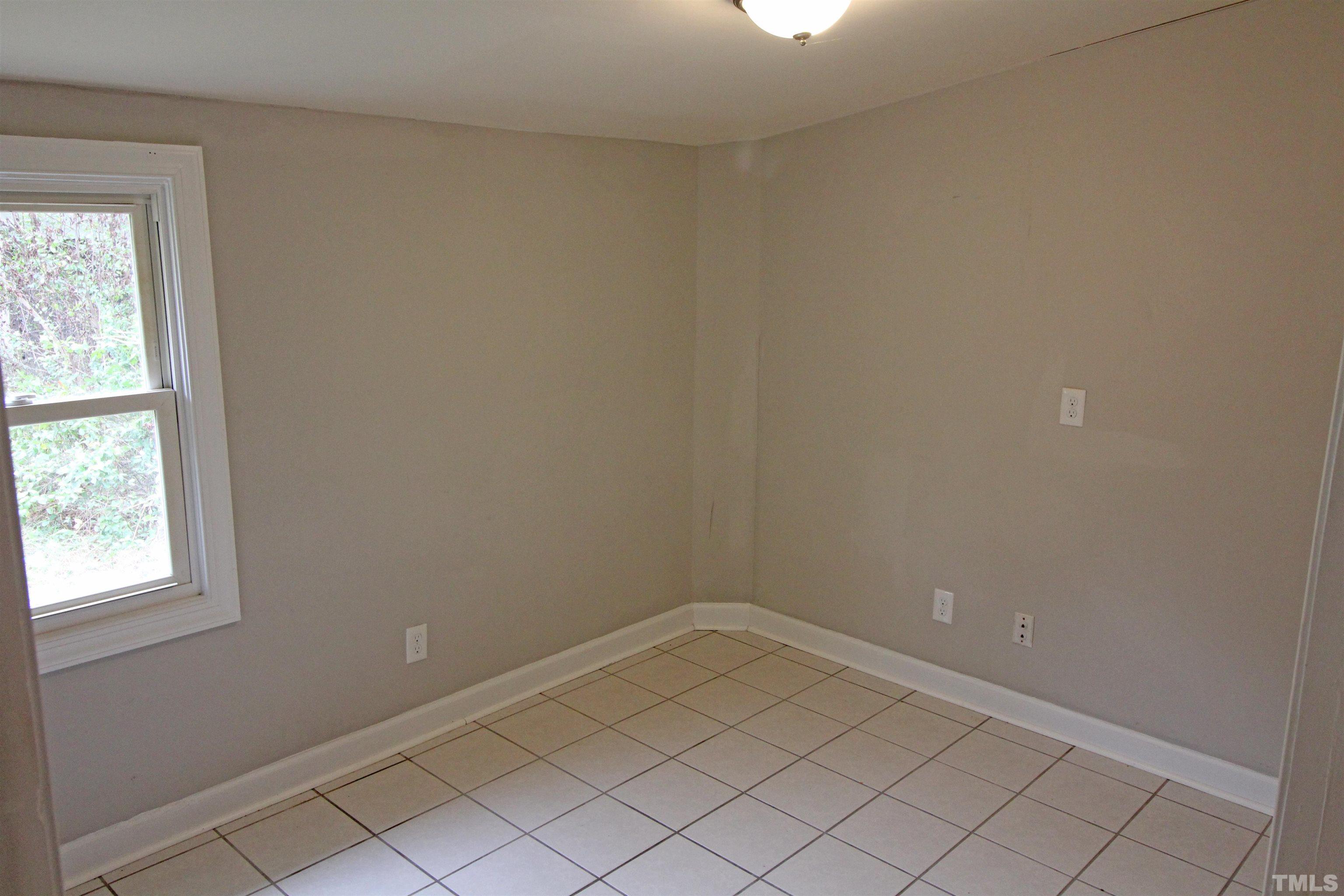 3202 Old Stage Road North Coats, NC 27521 - Photo 14 of 20 an empty room and window