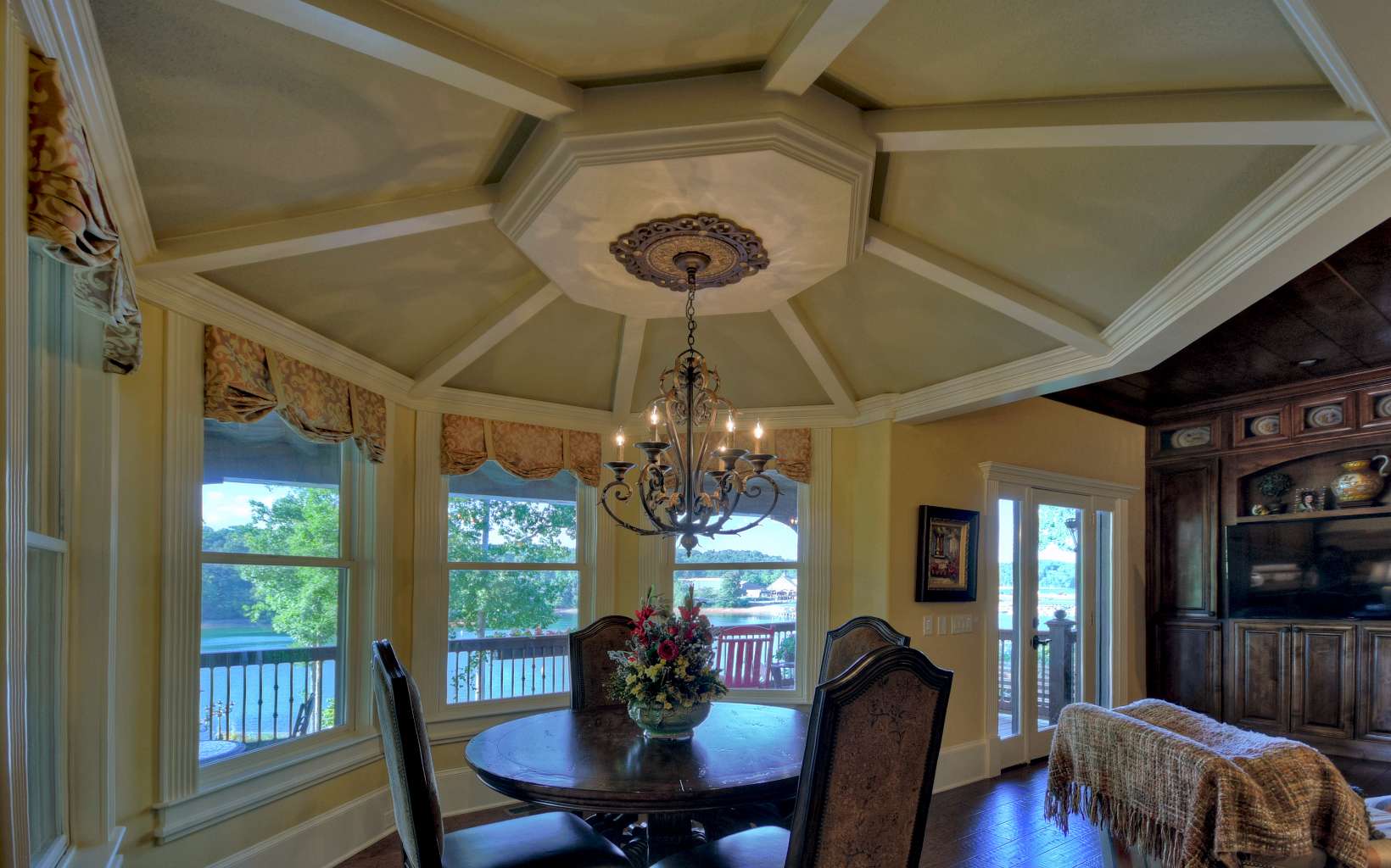 474 Stewart Camp Point Blue Ridge, GA 30513 - Photo 45 of 75 a view of a dining room with furniture wooden floor and chandelier