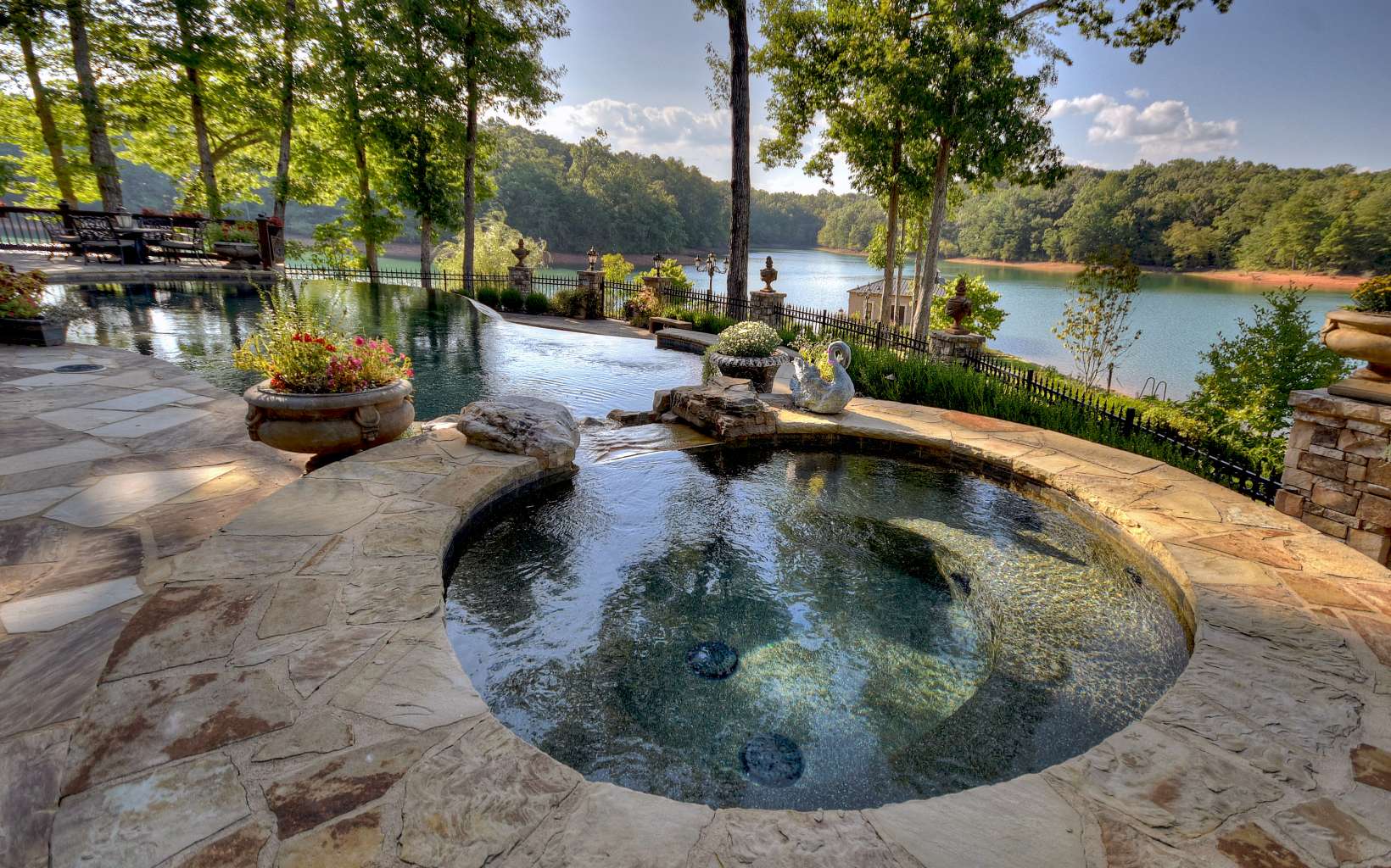 474 Stewart Camp Point Blue Ridge, GA 30513 - Photo 5 of 75 a view of a swimming pool with outdoor seating and lake