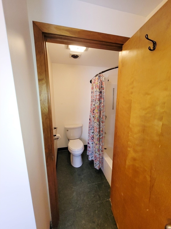 46 Long Hill Road, Unit RIGHT Groton, MA 01450 - Photo 15 of 30 a bathroom with a granite countertop sink toilet and shower