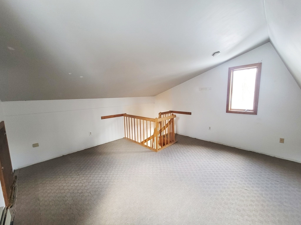 46 Long Hill Road, Unit RIGHT Groton, MA 01450 - Photo 29 of 30 an empty room with windows