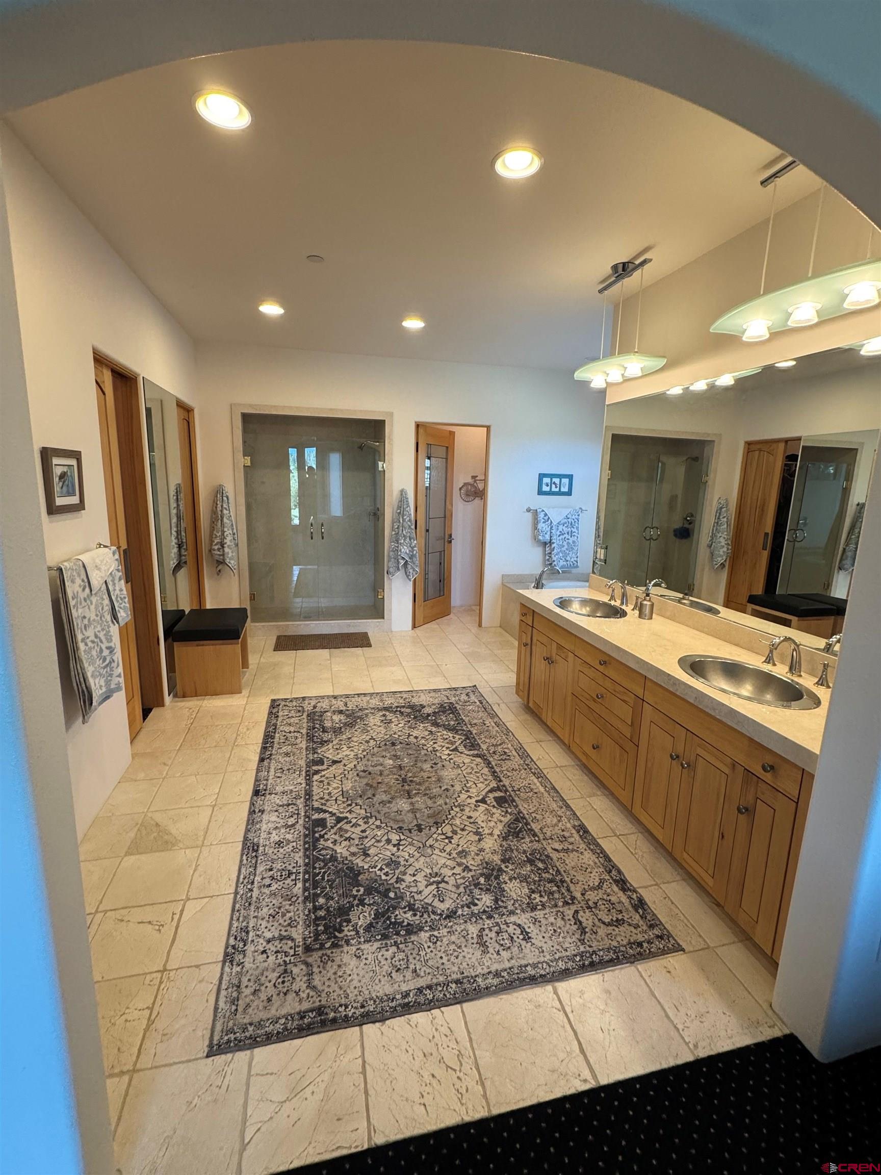 550 Wildcat Trail Hesperus, CO 81326 - Photo 13 of 27 a large kitchen with kitchen island a stove a sink dishwasher and cabinets