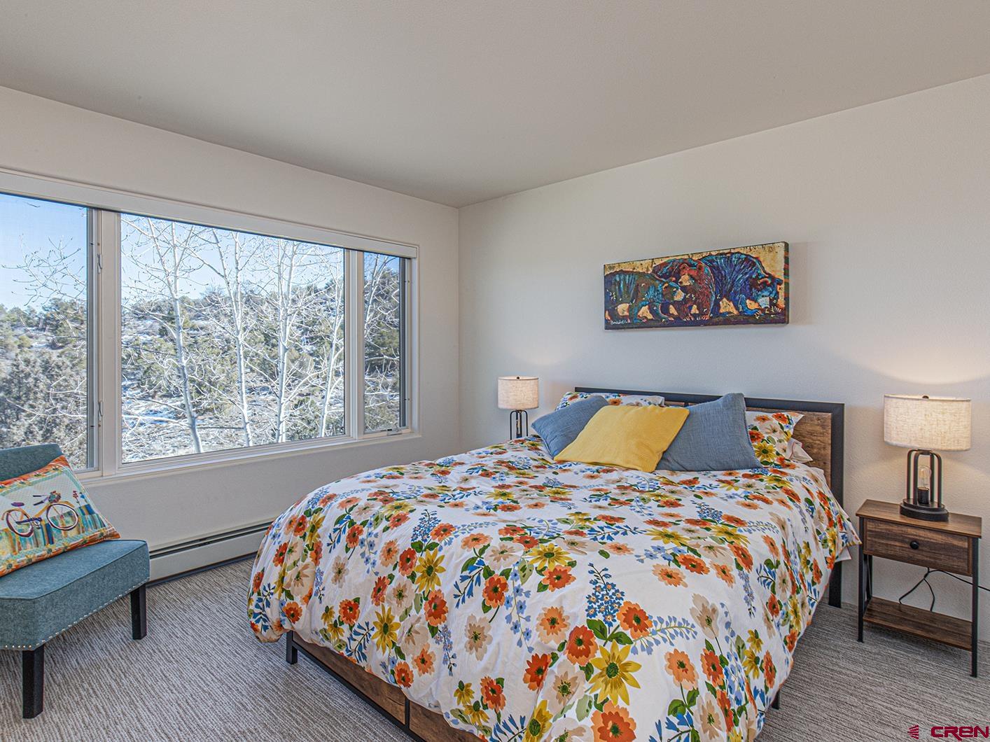 550 Wildcat Trail Hesperus, CO 81326 - Photo 17 of 27 a bed sitting in a bedroom next to a window