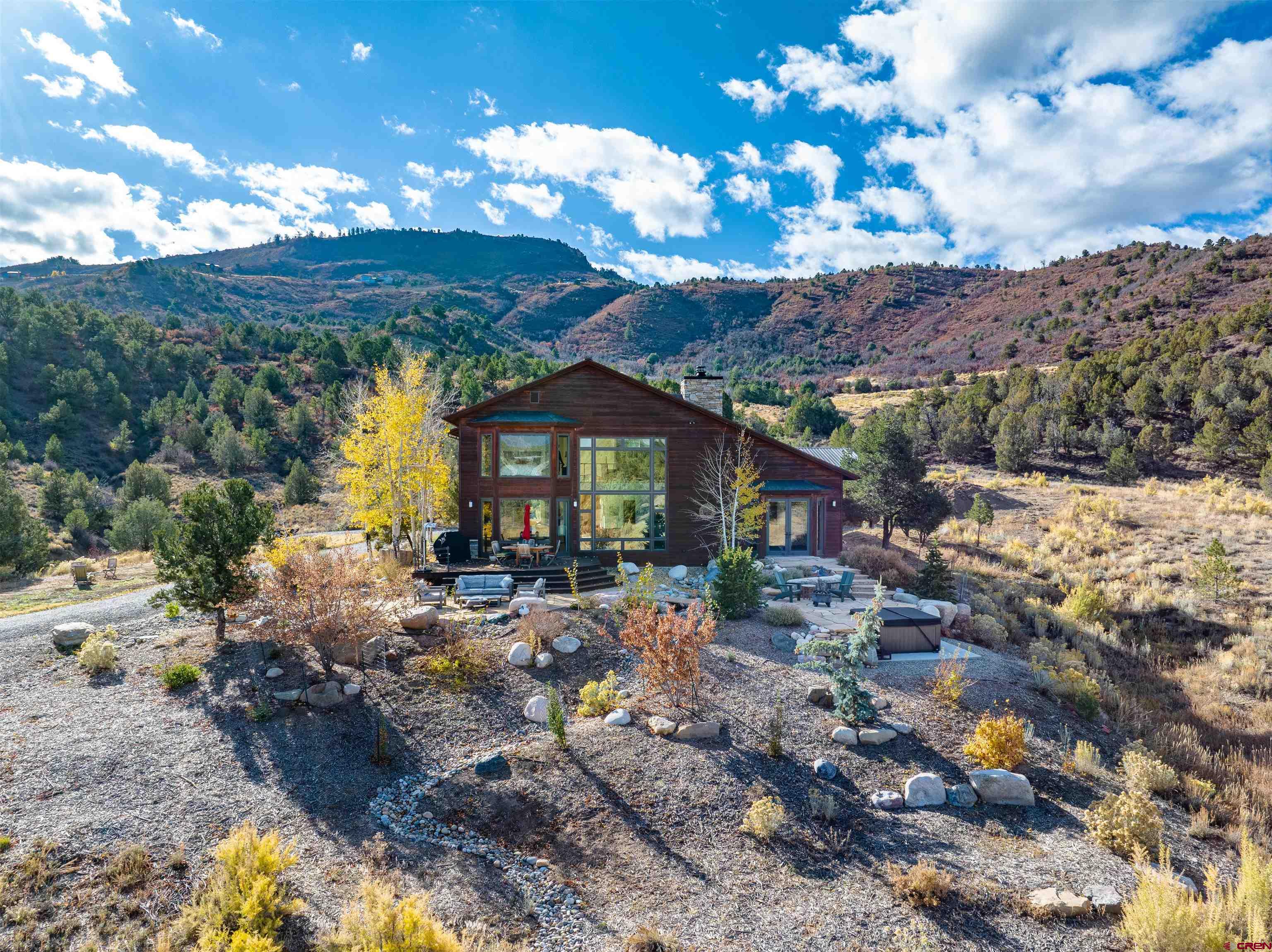 550 Wildcat Trail Hesperus, CO 81326 - Photo 24 of 27 a view of a house with a yard