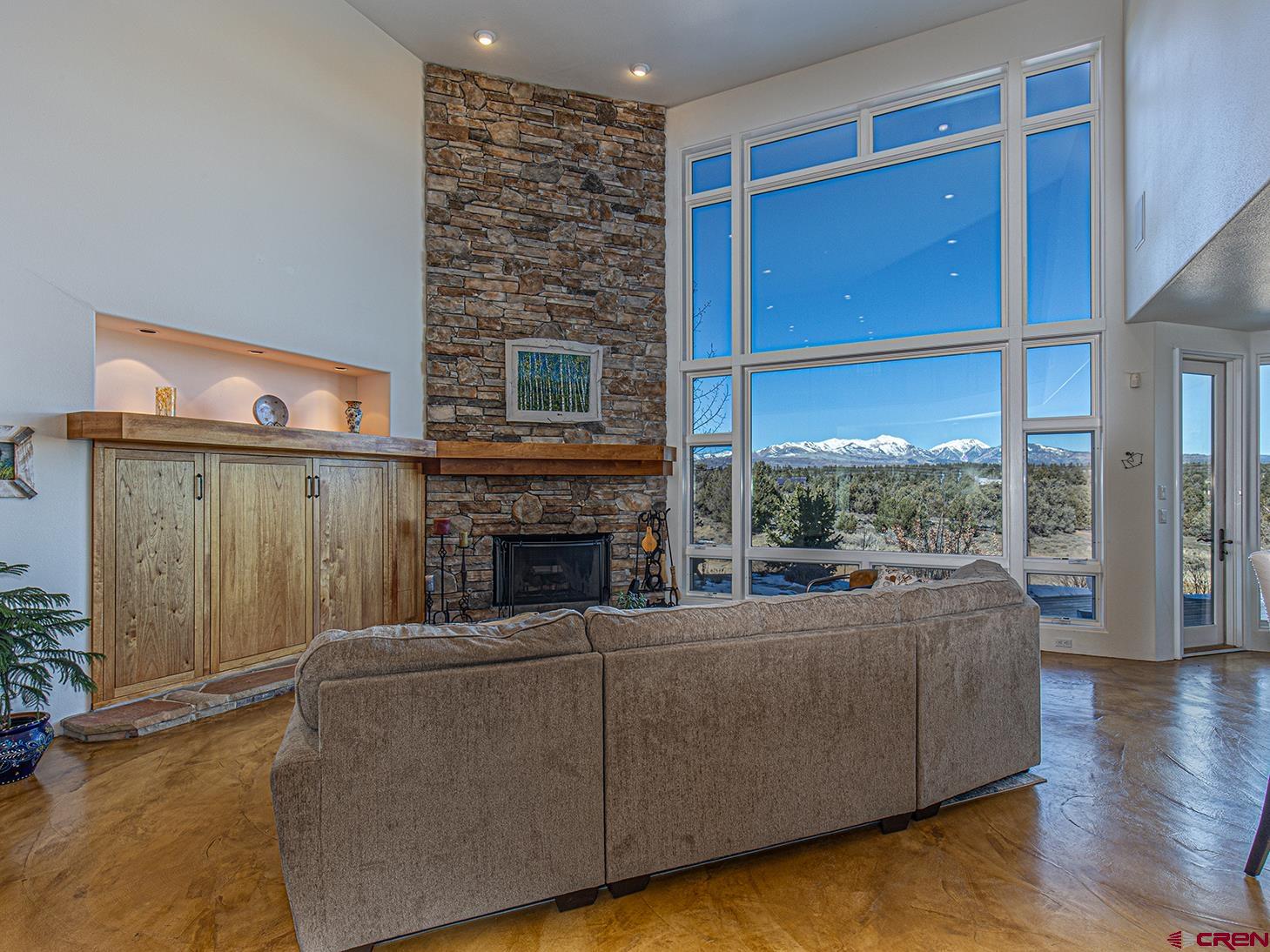 550 Wildcat Trail Hesperus, CO 81326 - Photo 4 of 27 a living room with furniture and a fireplace