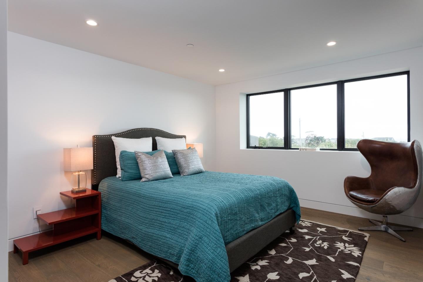 311 Magellan Avenue Half Moon Bay, CA 94019 - Photo 26 of 37 a bedroom with a bed and window