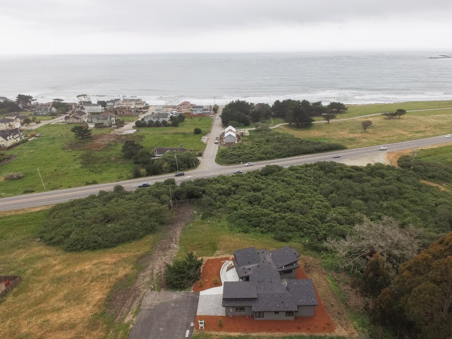 311 Magellan Avenue Half Moon Bay, CA 94019 - Photo 32 of 37 a view of a lake with a city