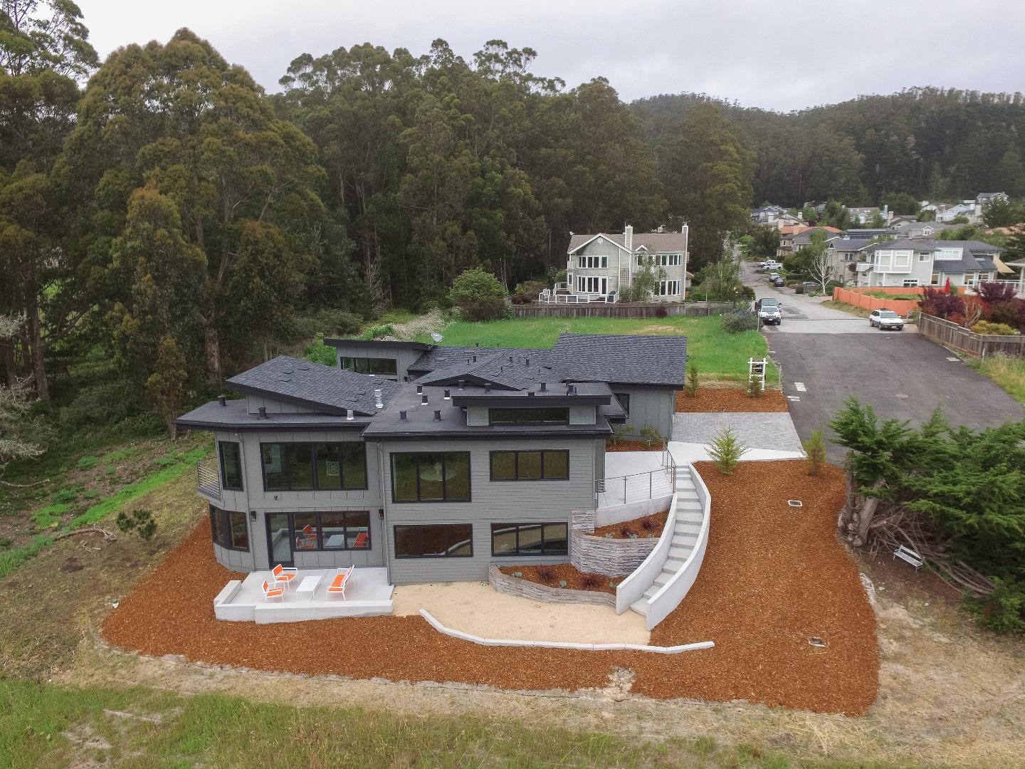 311 Magellan Avenue Half Moon Bay, CA 94019 - Photo 35 of 37 an aerial view of a house with swimming pool and a yard