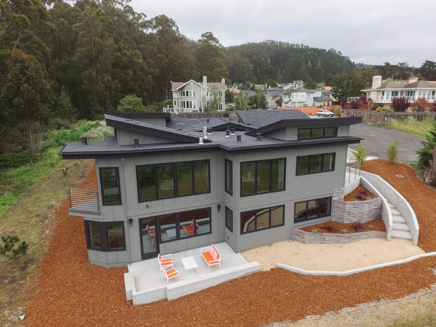 311 Magellan Avenue Half Moon Bay, CA 94019 - Photo 36 of 37 a view of a house with roof deck and sitting area
