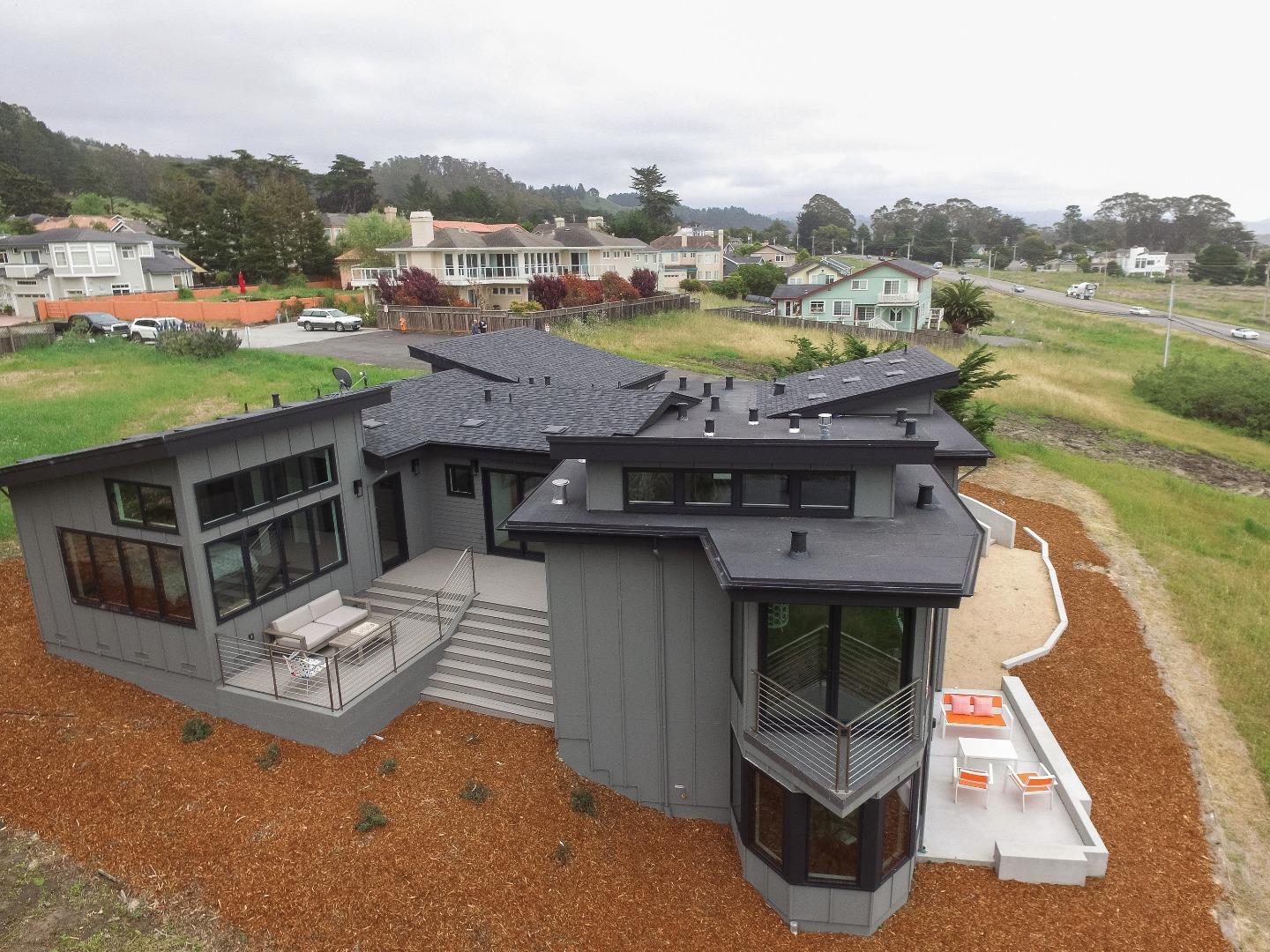 311 Magellan Avenue Half Moon Bay, CA 94019 - Photo 37 of 37 an aerial view of a house with pool lake view and mountain view