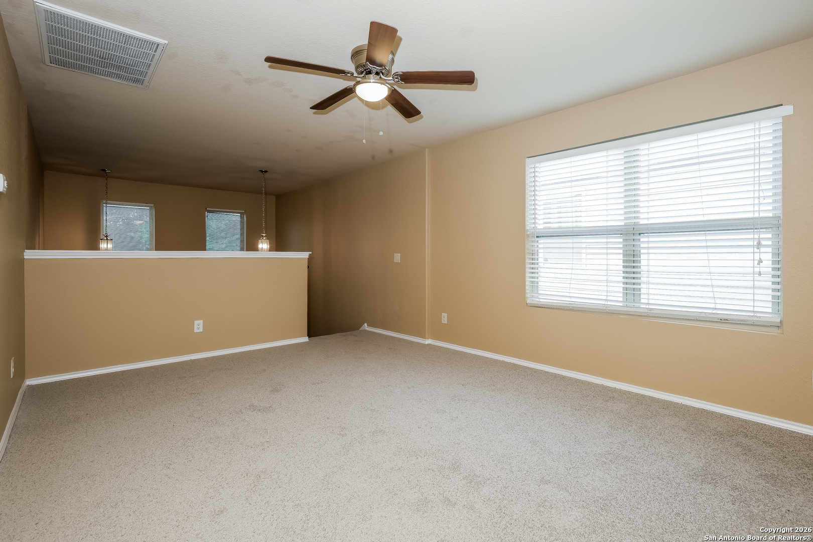 3415 Dunlap Fields Converse, TX 78109 - Photo 14 of 17 a view of an empty room with a window