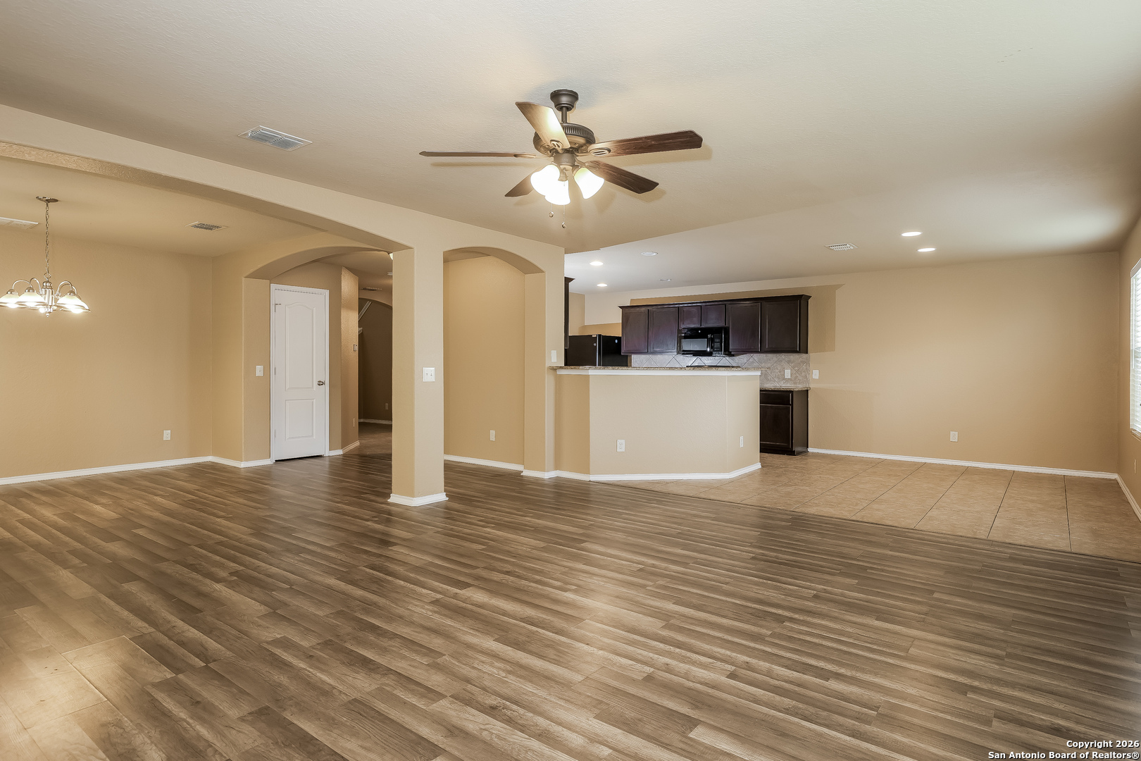 3415 Dunlap Fields Converse, TX 78109 - Photo 3 of 17 a view of a kitchen with a sink and a refrigerator