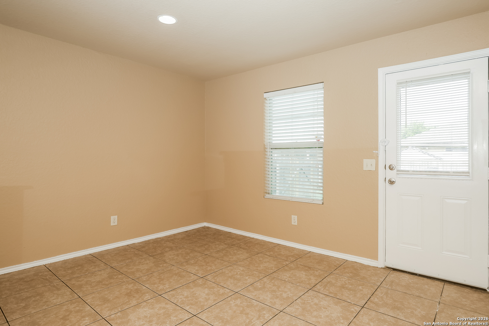 3415 Dunlap Fields Converse, TX 78109 - Photo 4 of 17 a view of an empty room with a window