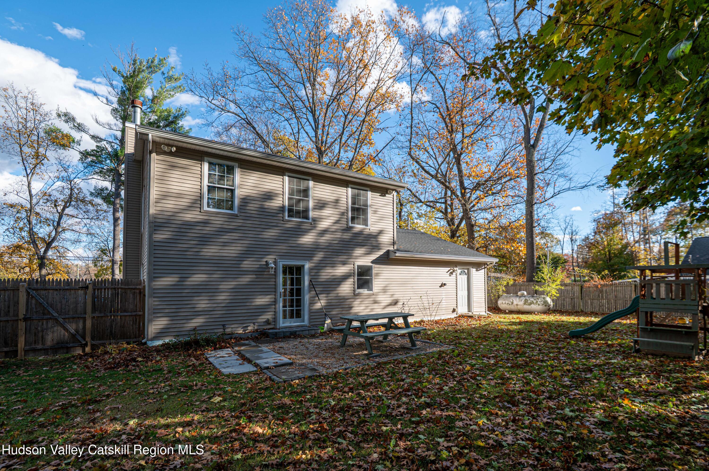 59 Hawley Road Niverville, NY 12130 - Photo 2 of 20 a front view of a house with a yard