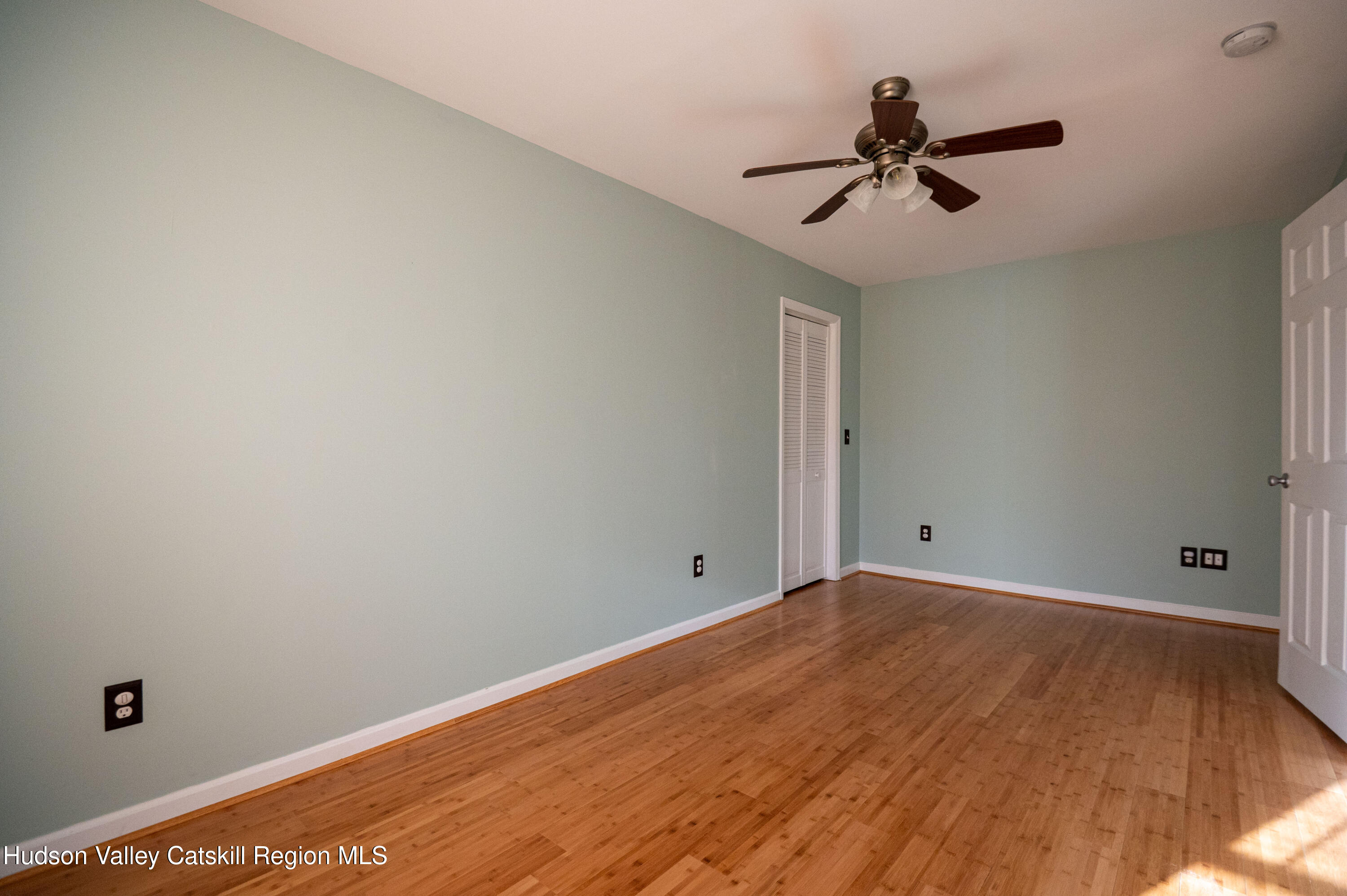 59 Hawley Road Niverville, NY 12130 - Photo 8 of 20 a view of empty room with wooden floor