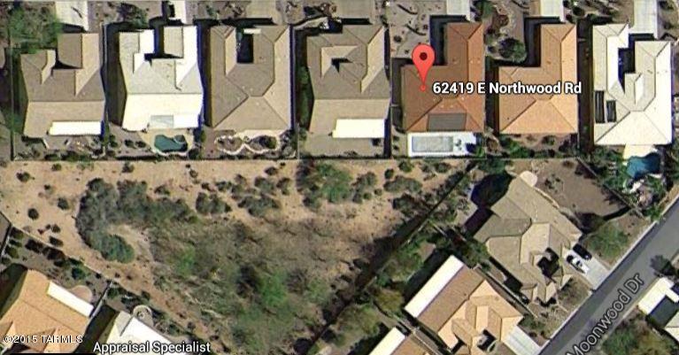 62419 East Northwood Road Tucson, AZ 85739 - Photo 27 of 30 an aerial view of residential house with parking