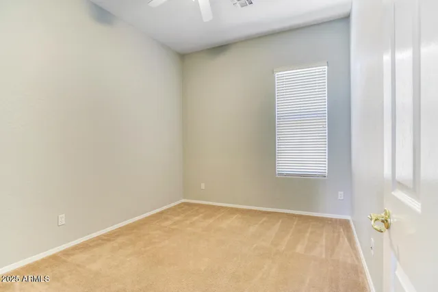 a view of a room that has a window in it