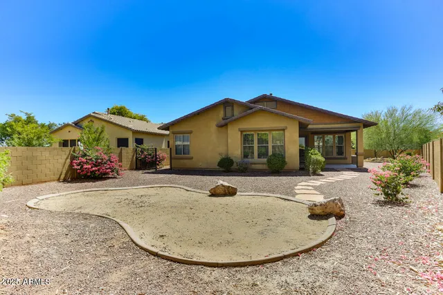 a view of a house with a swimming pool