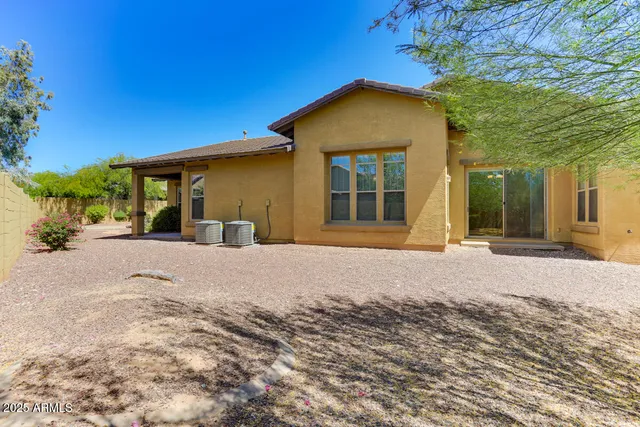 a view of a house with a yard and garage