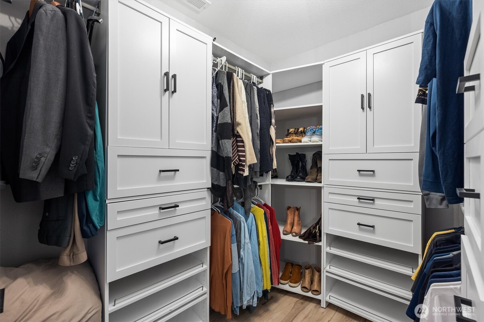508 Caldwell Road Castle Rock, WA 98611 - Photo 23 of 40 a view of walk in closet with clothes and shoes