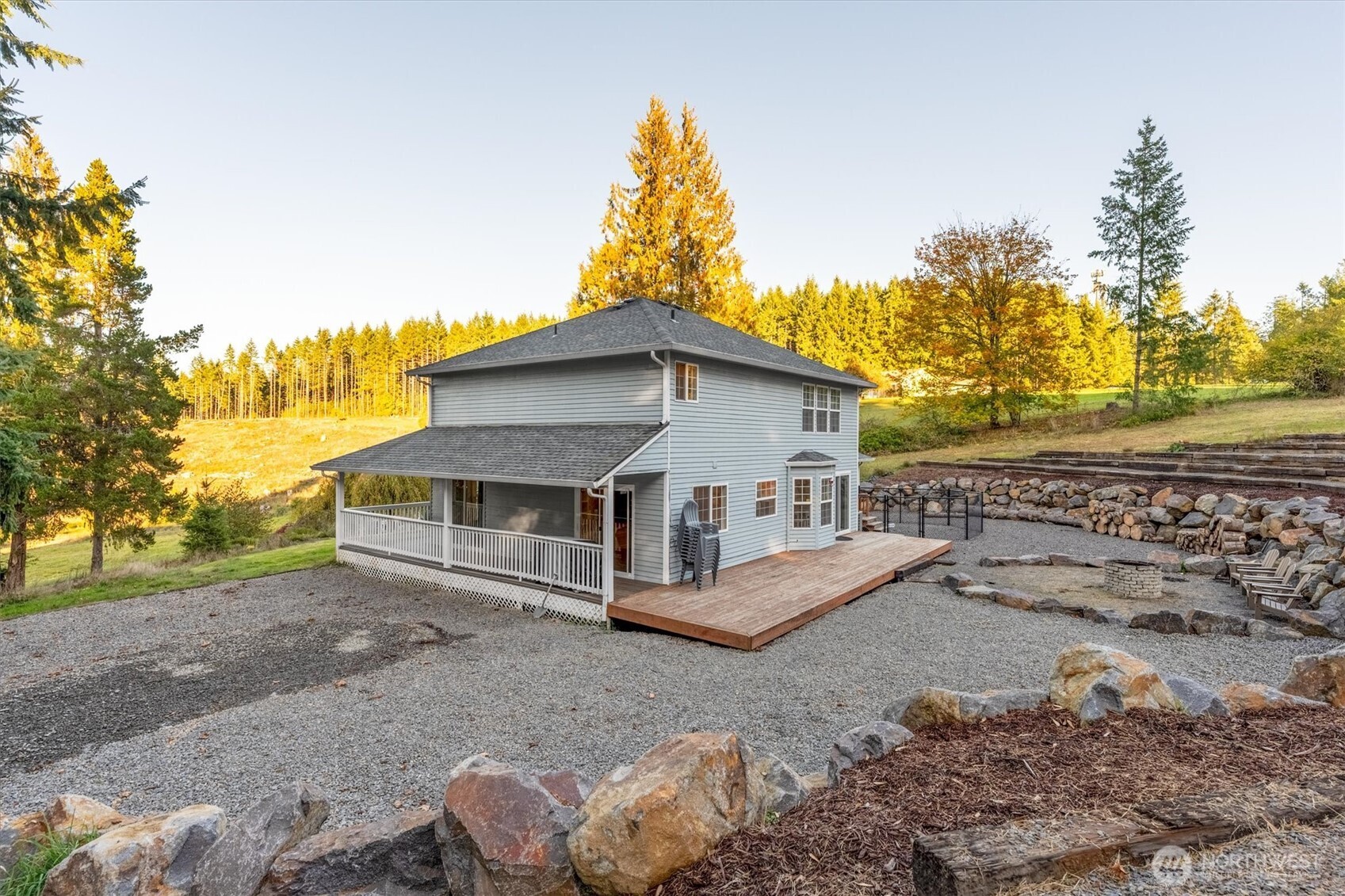 508 Caldwell Road Castle Rock, WA 98611 - Photo 34 of 40 a view of a house with a yard