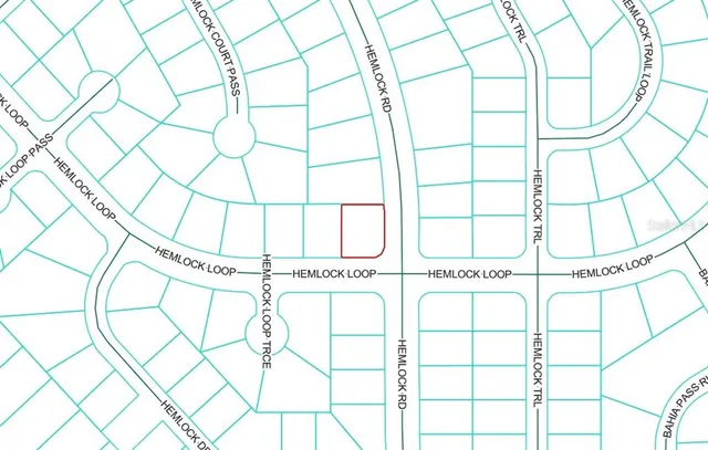 a bathroom with a white shower and a window