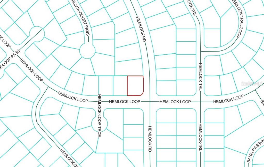 a bathroom with a white shower and a window