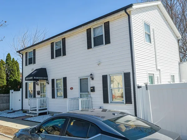 a front view of house with yard outdoor seating area