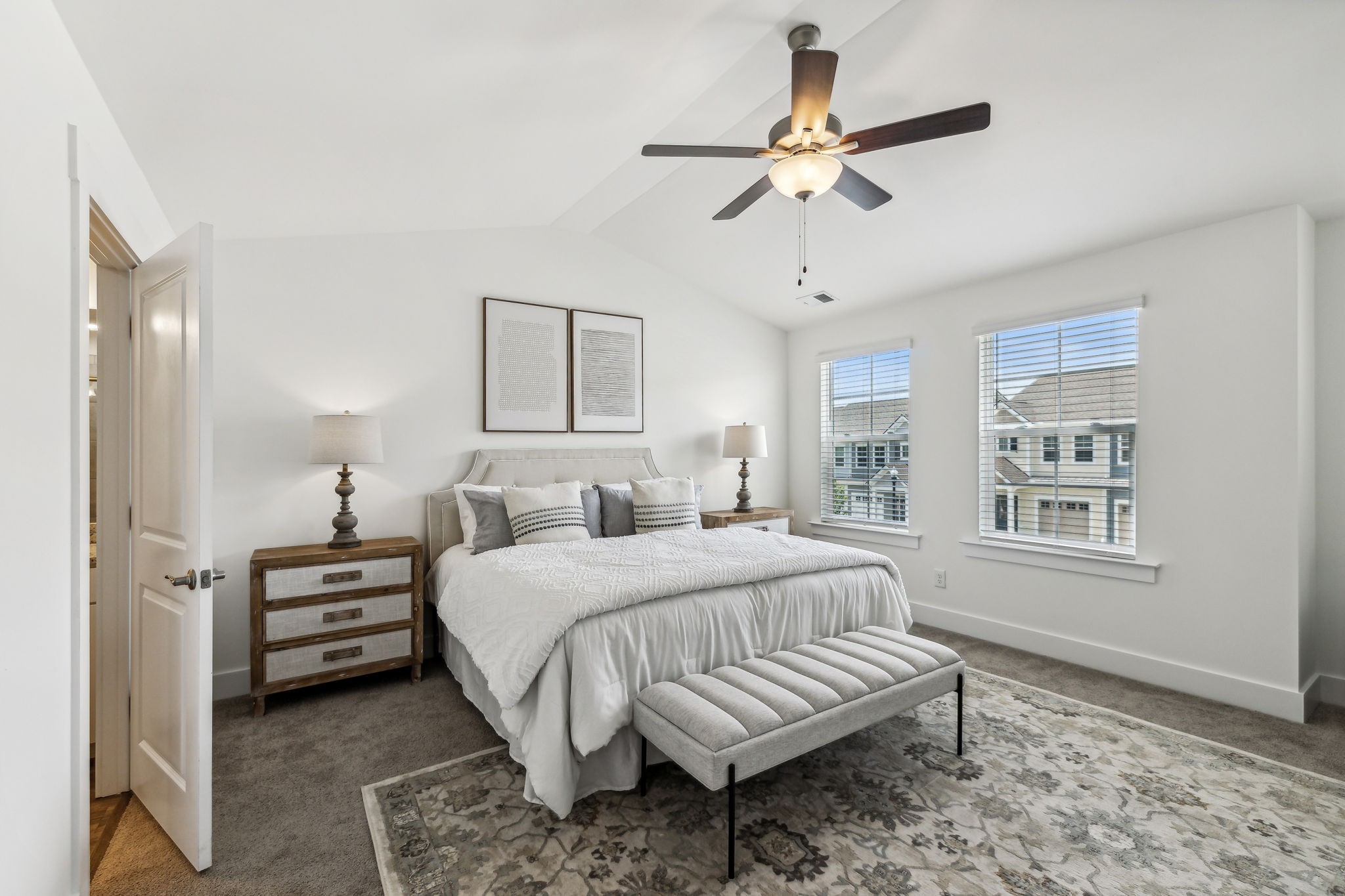 7144 Gracious Drive Franklin, TN 37064 - Photo 17 of 32 a bedroom with a bed and a chandelier