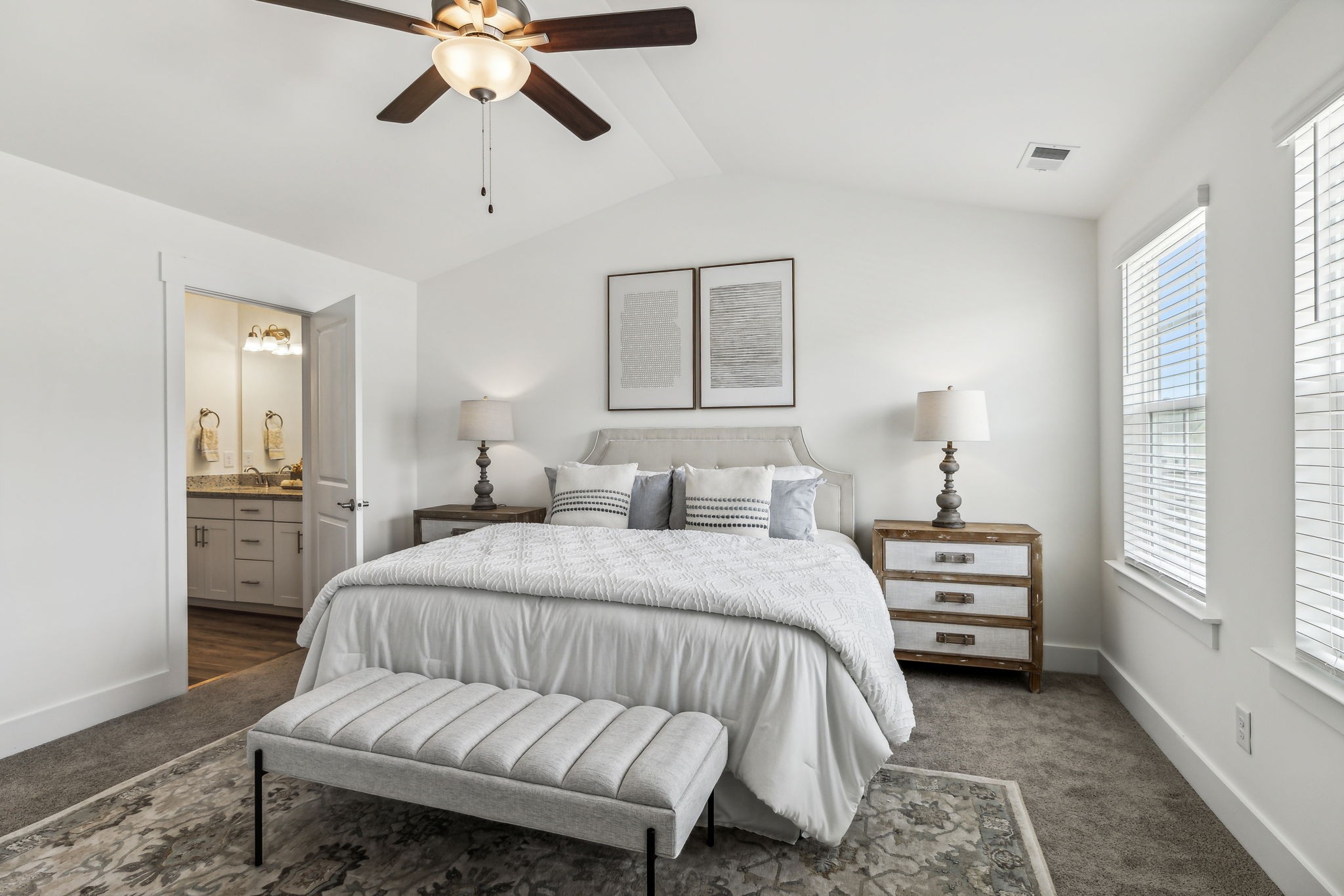 7144 Gracious Drive Franklin, TN 37064 - Photo 20 of 32 a bedroom with a bed and a chandelier
