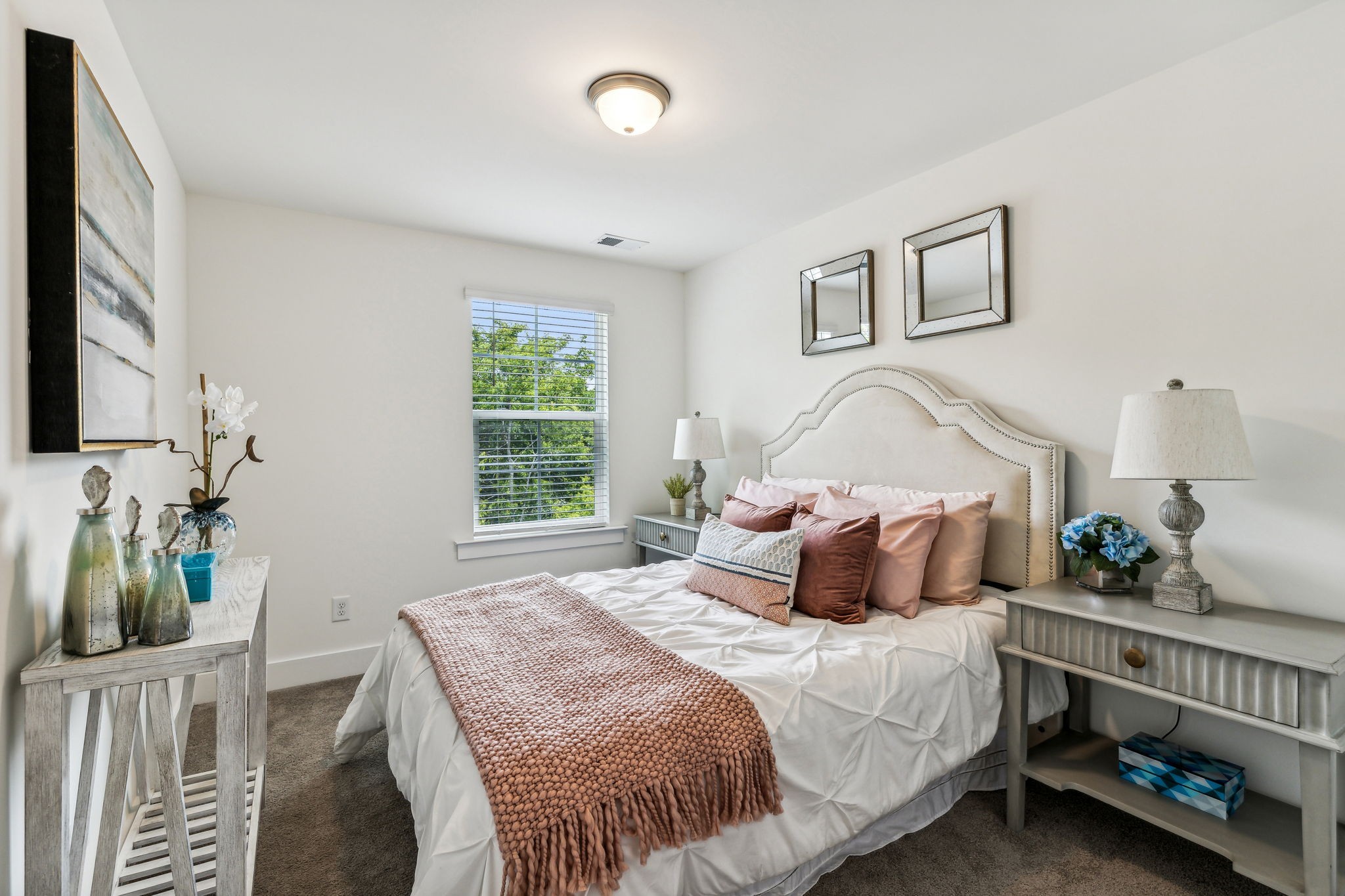7144 Gracious Drive Franklin, TN 37064 - Photo 30 of 32 a bedroom with a bed a couch and a window