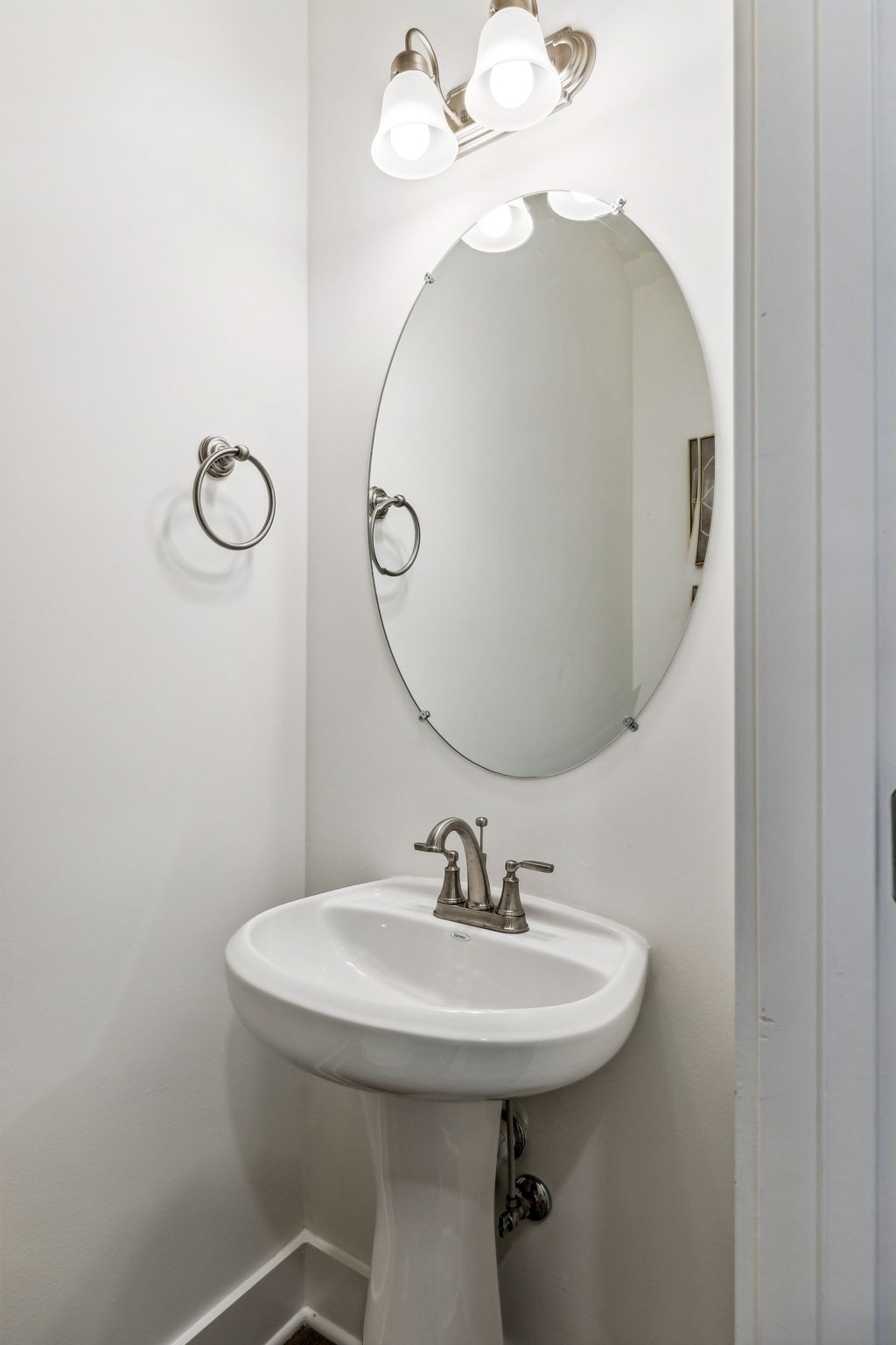 7144 Gracious Drive Franklin, TN 37064 - Photo 4 of 32 a bathroom with a sink and mirror