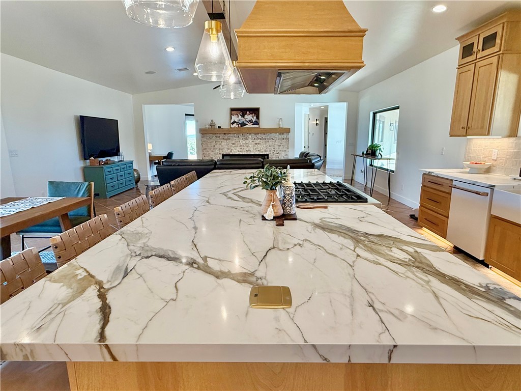 919 West Jordan Ranch Road Kingman, AZ 86409 - Photo 17 of 53 Gorgeous quartz counter tops with top mounted outlets for convenience.