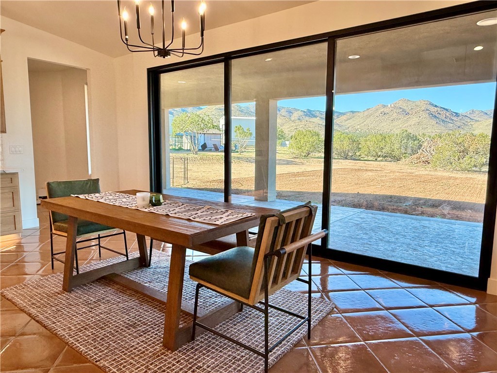 919 West Jordan Ranch Road Kingman, AZ 86409 - Photo 19 of 53 Amazing views and the ability to open the 3 tiered sliding glass door so you can feel the open air!