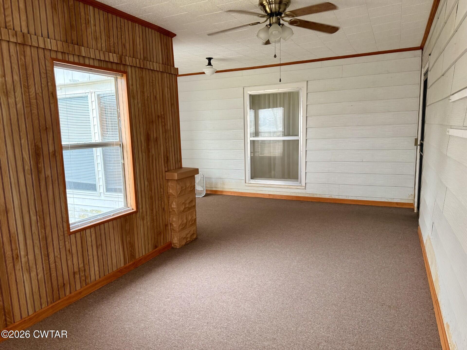 406 Maple Heights Street Kenton, TN 38233 - Photo 29 of 43 an empty room with windows