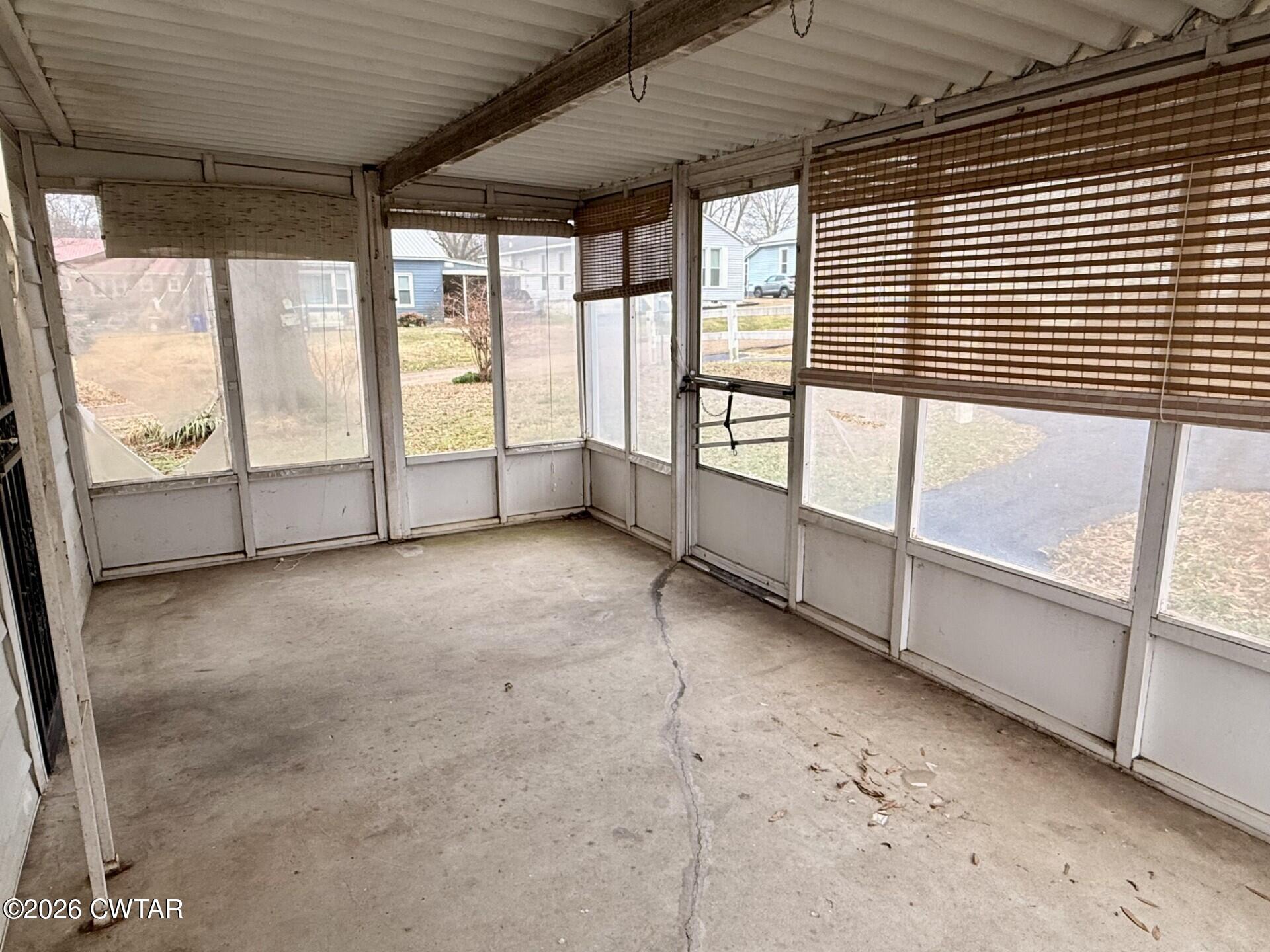 406 Maple Heights Street Kenton, TN 38233 - Photo 38 of 43 a view of an empty room with a balcony