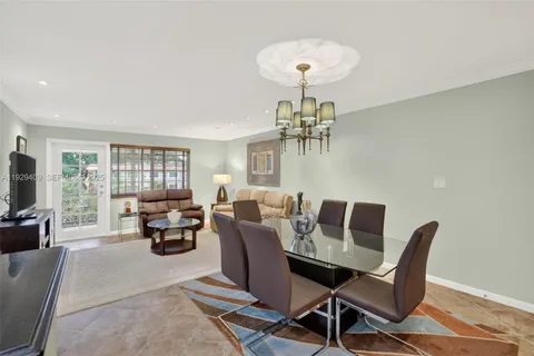 a view of a workspace with furniture